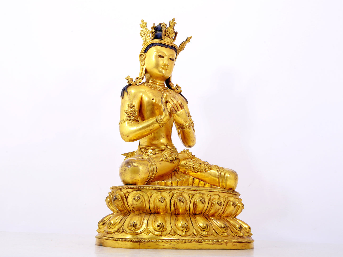 A solemn gilt bronze statue of Bodhisattva