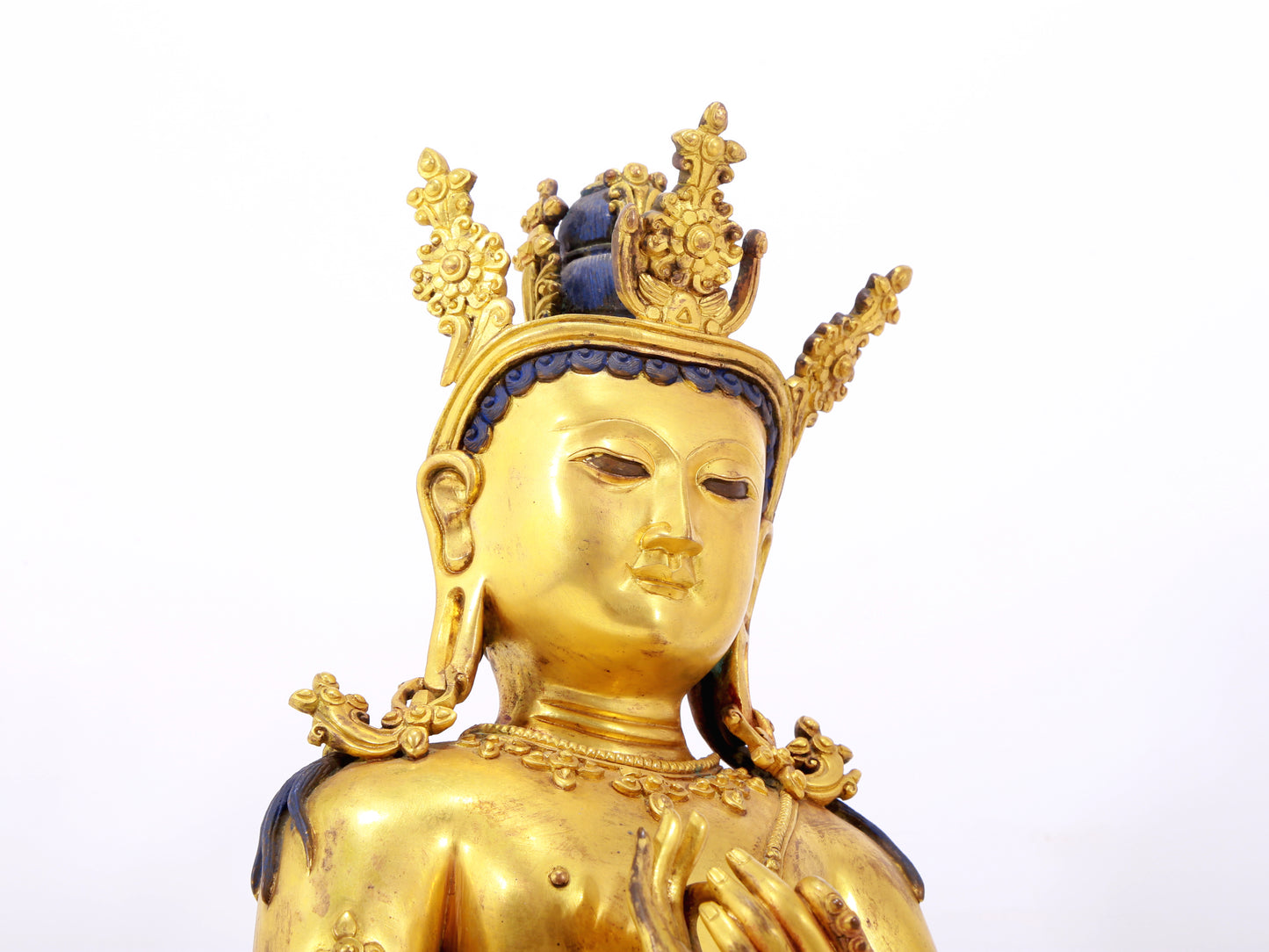 A solemn gilt bronze statue of Bodhisattva