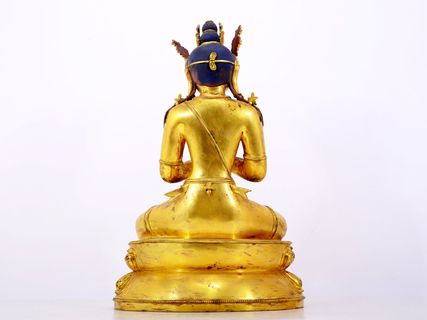 A solemn gilt bronze statue of Bodhisattva