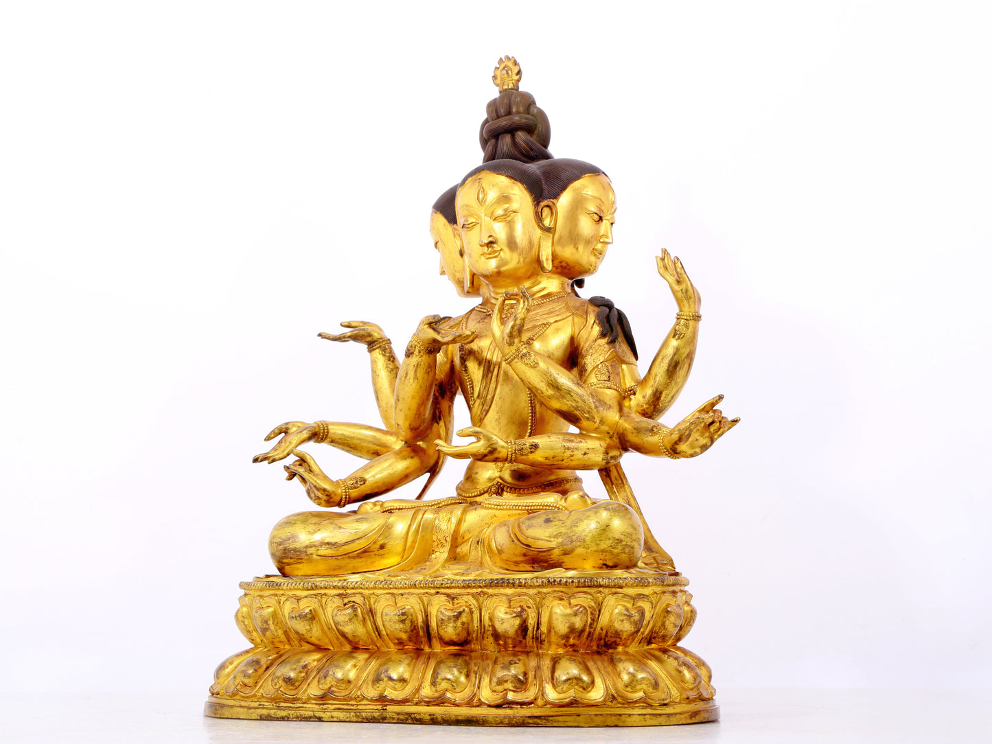 A solemn gilt bronze statue of Bodhisattva