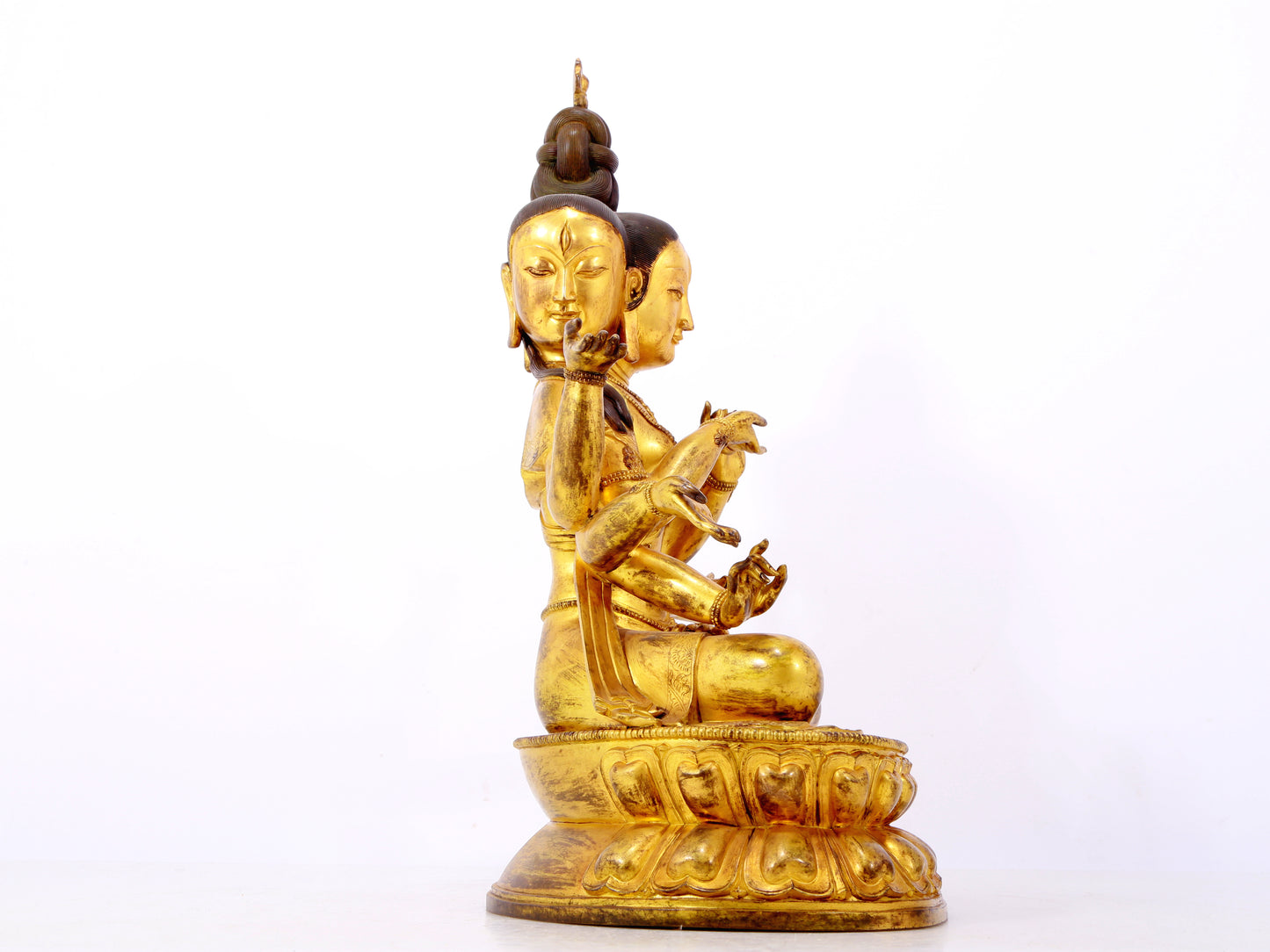 A solemn gilt bronze statue of Bodhisattva