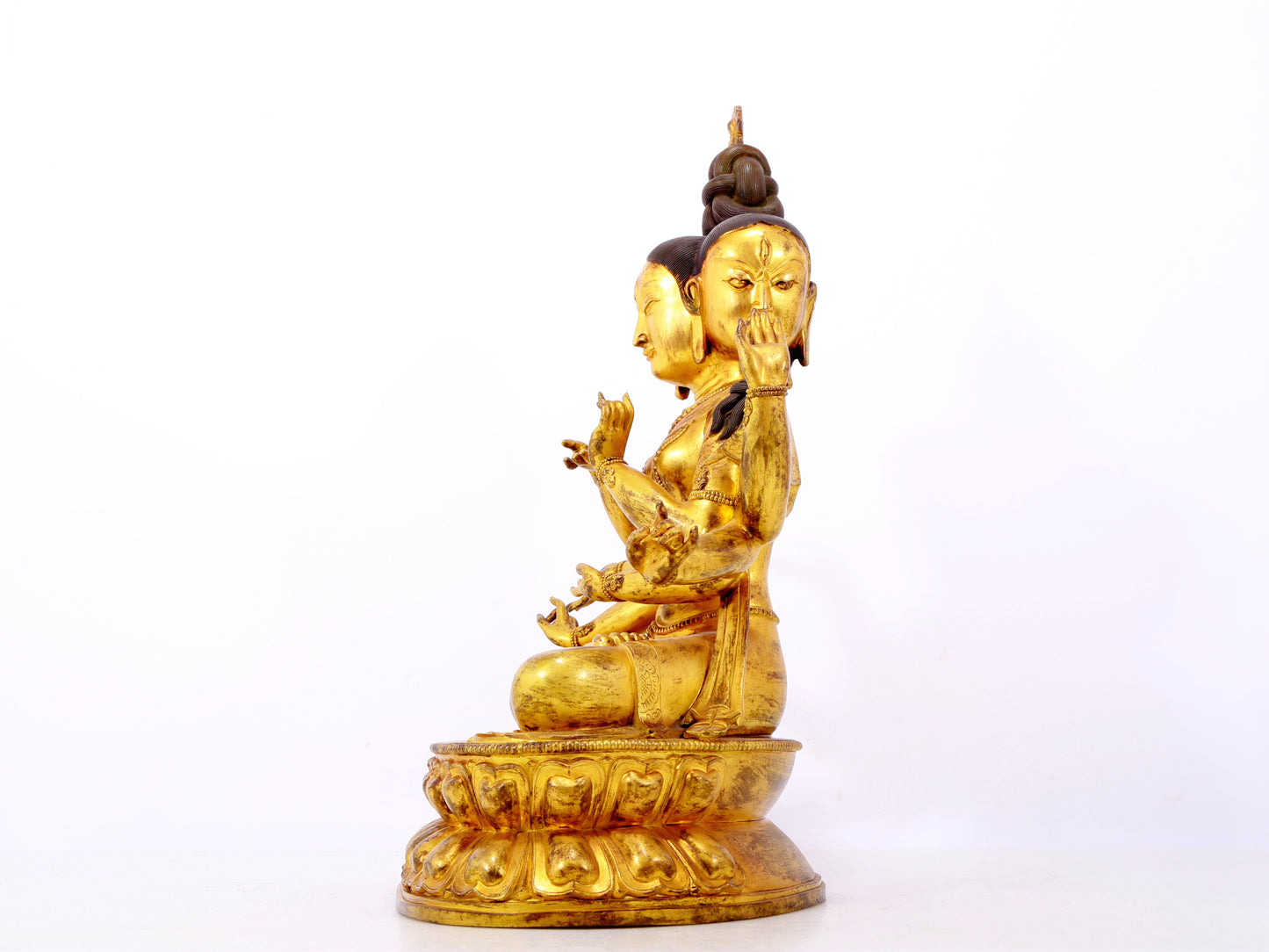 A solemn gilt bronze statue of Bodhisattva