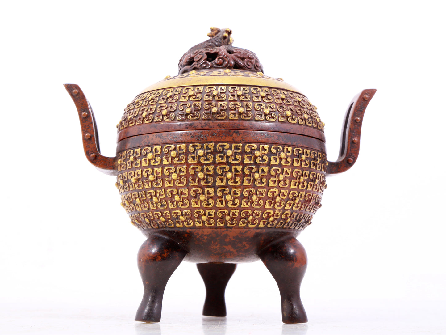 An exquisite gilt bronze double-eared and tripod censer with auspicious clouds and dragon pattern and lid