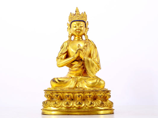 A solemn gilt bronze statue of Bodhisattva