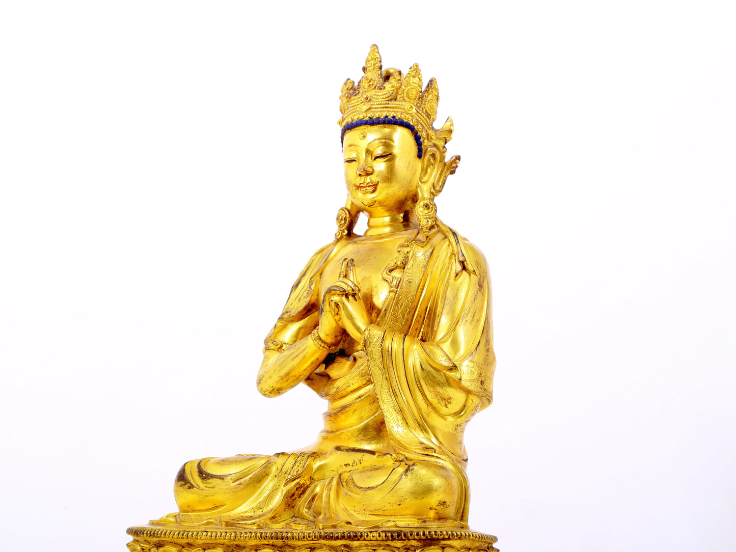 A solemn gilt bronze statue of Bodhisattva