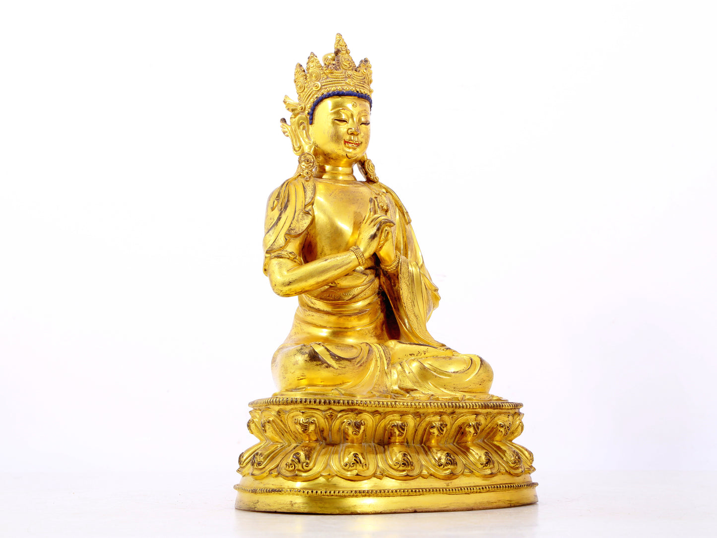 A solemn gilt bronze statue of Bodhisattva