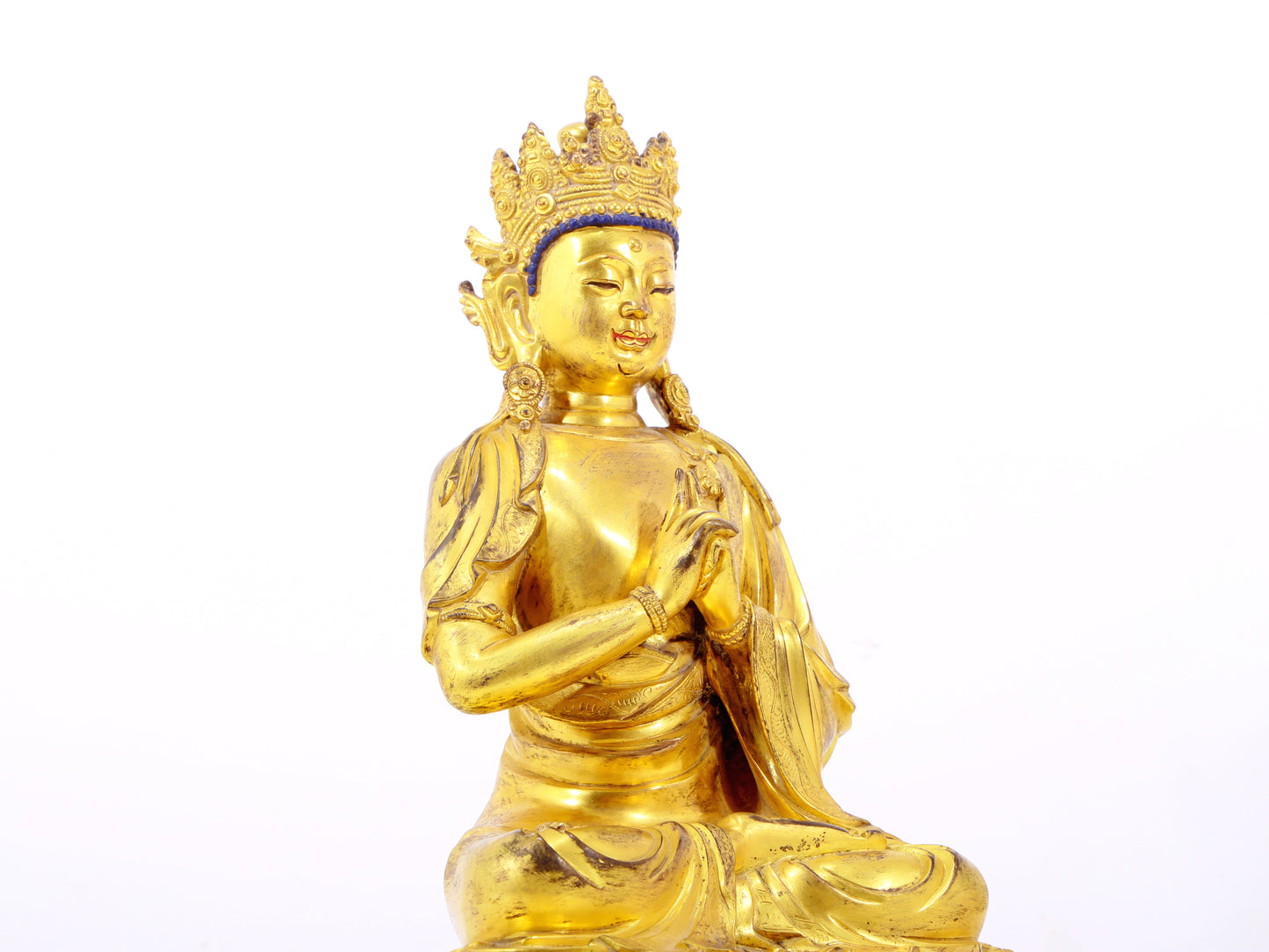 A solemn gilt bronze statue of Bodhisattva