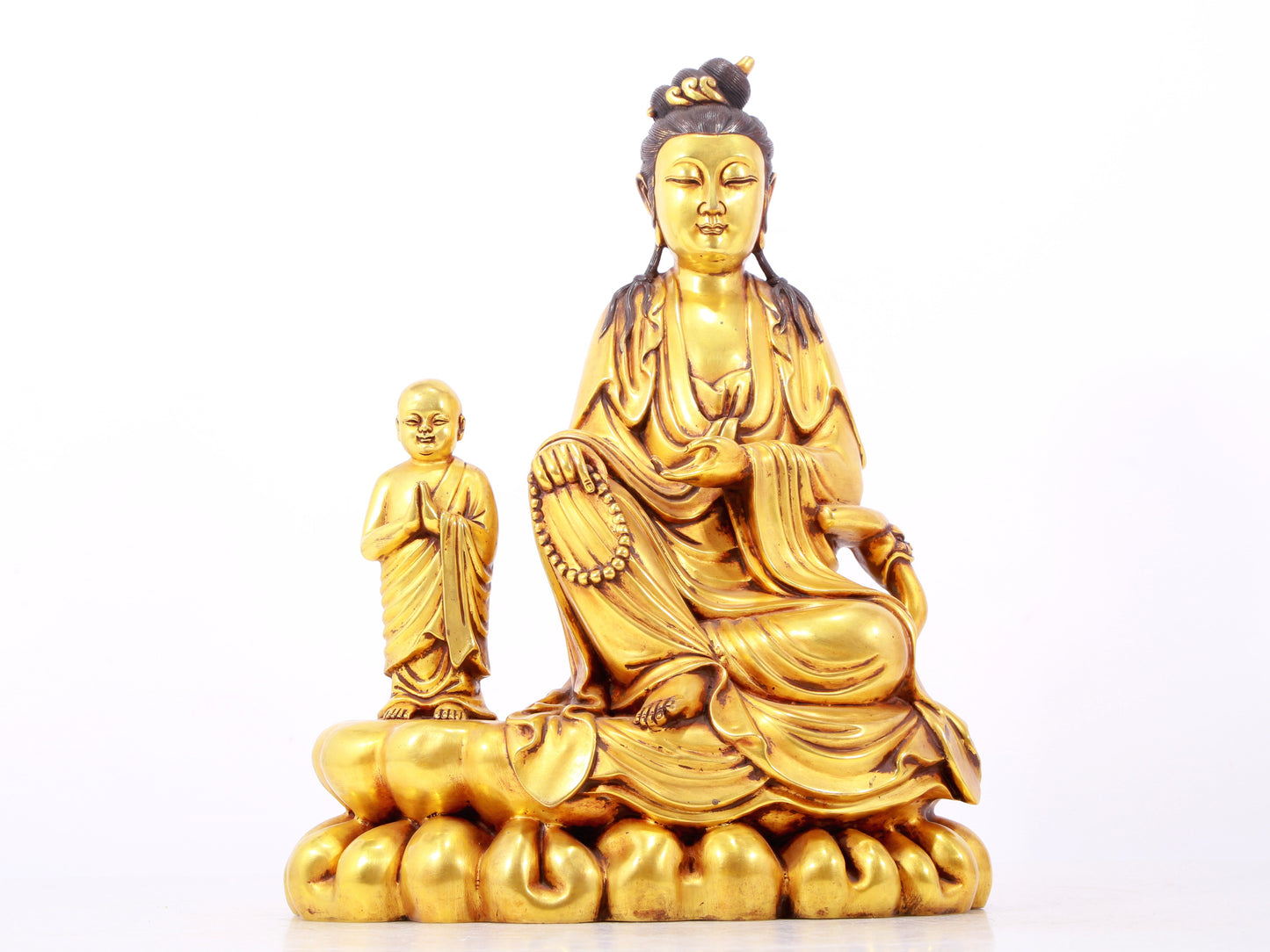 A majestic gilt bronze statue of Guanyin