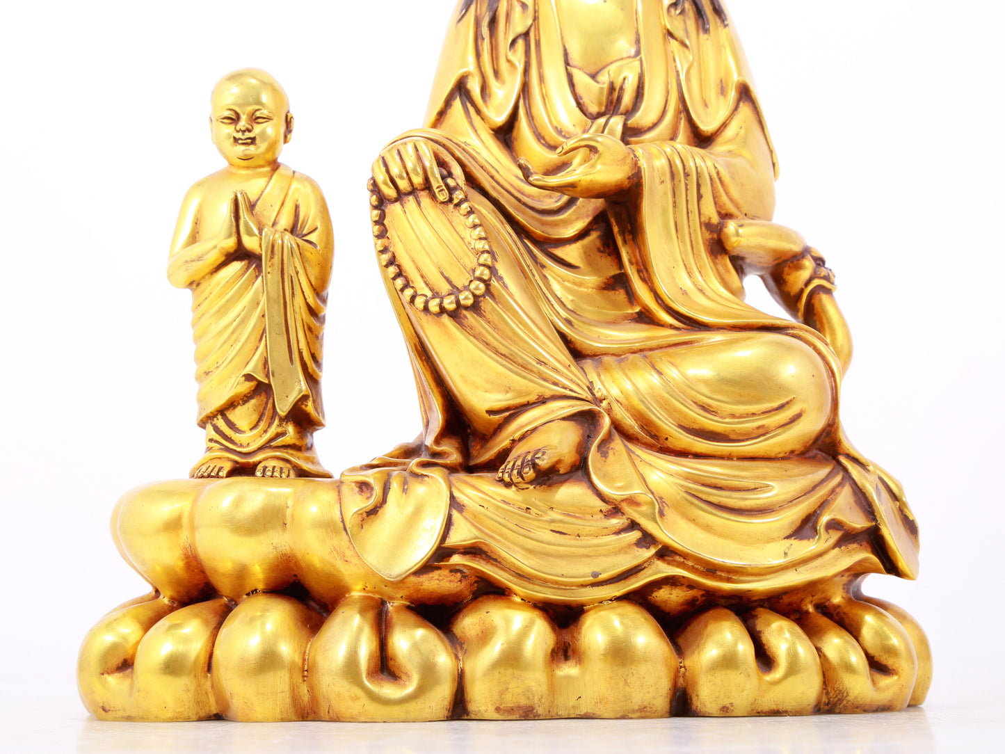 A majestic gilt bronze statue of Guanyin