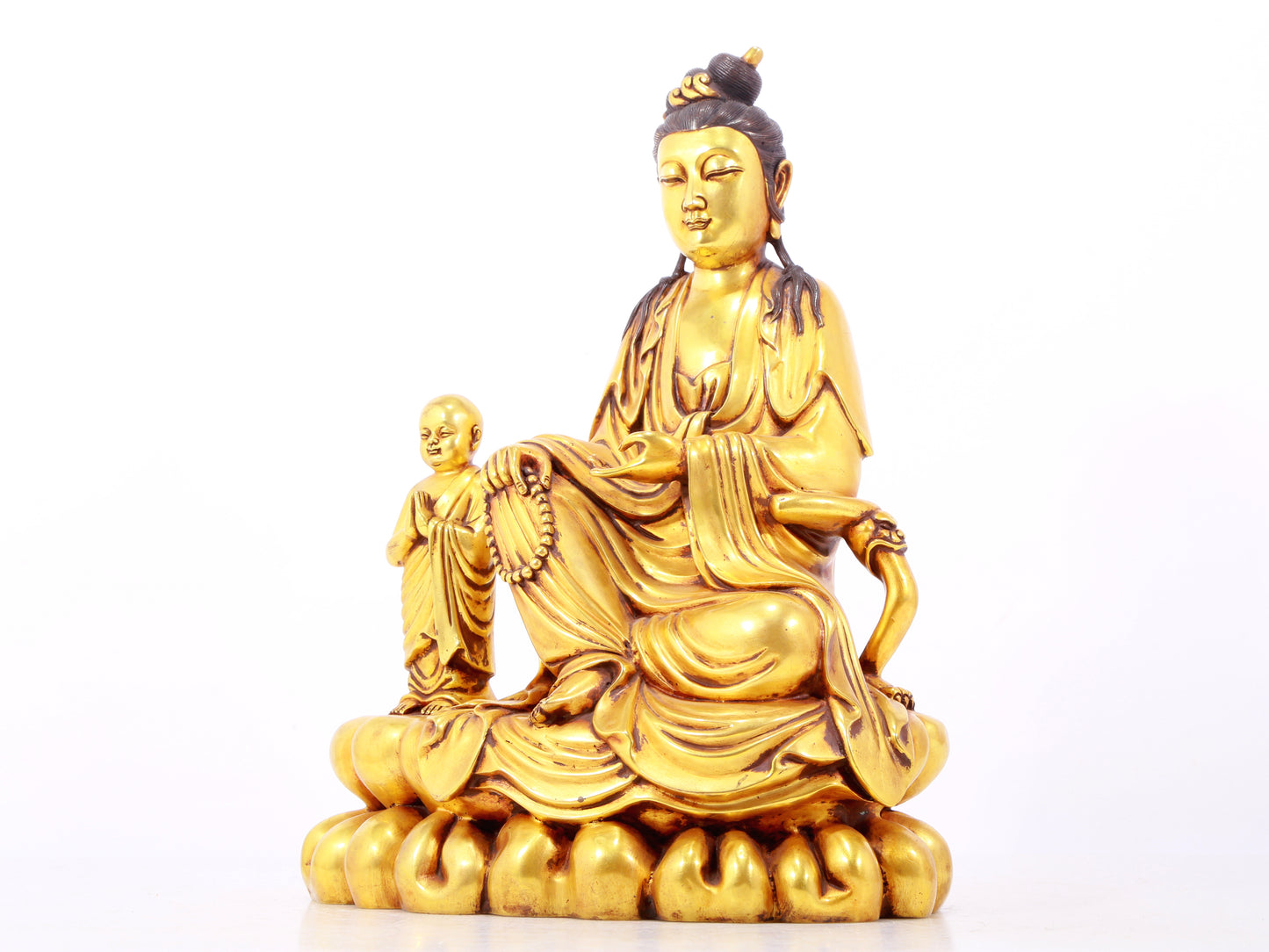 A majestic gilt bronze statue of Guanyin