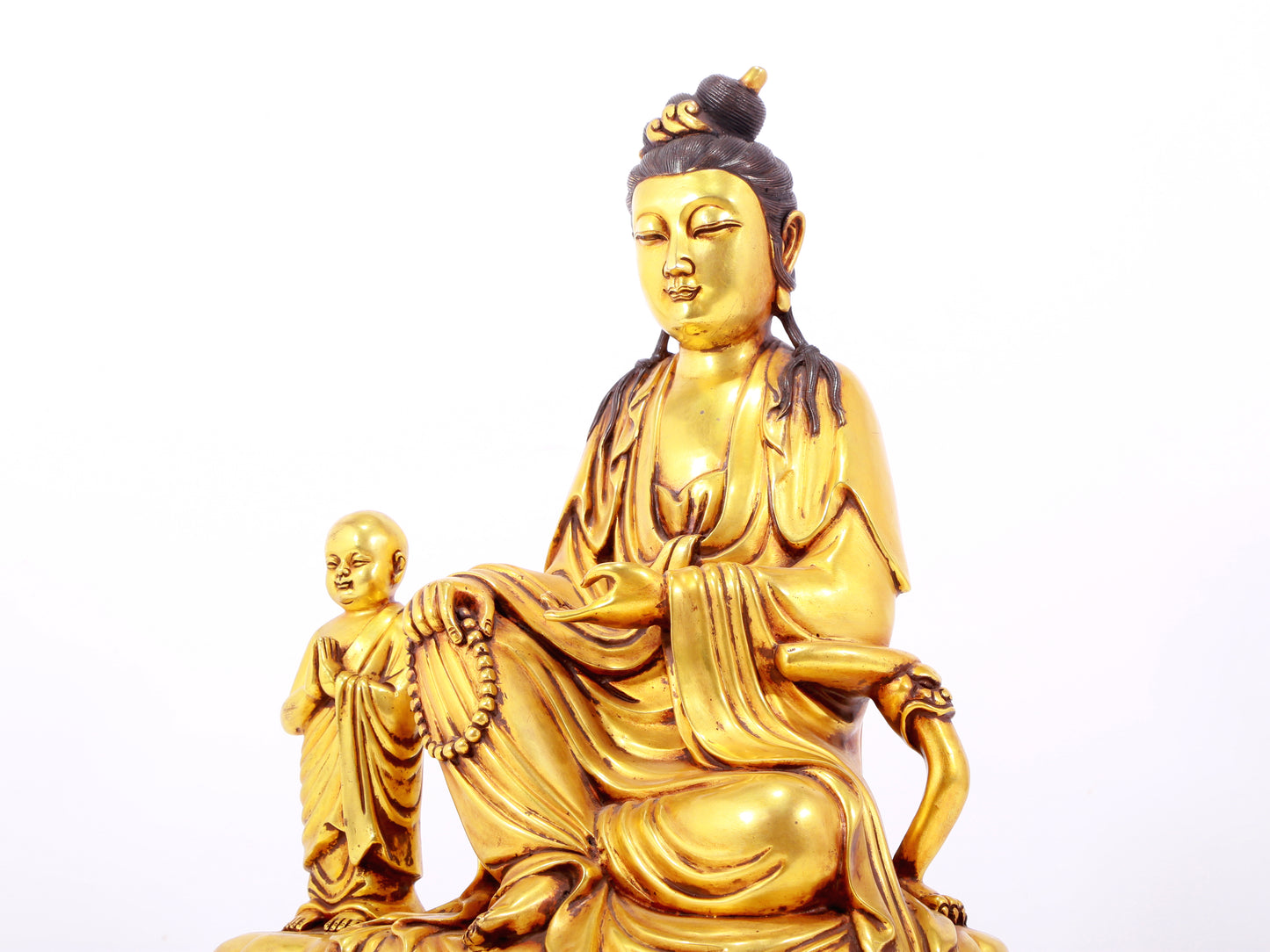 A majestic gilt bronze statue of Guanyin