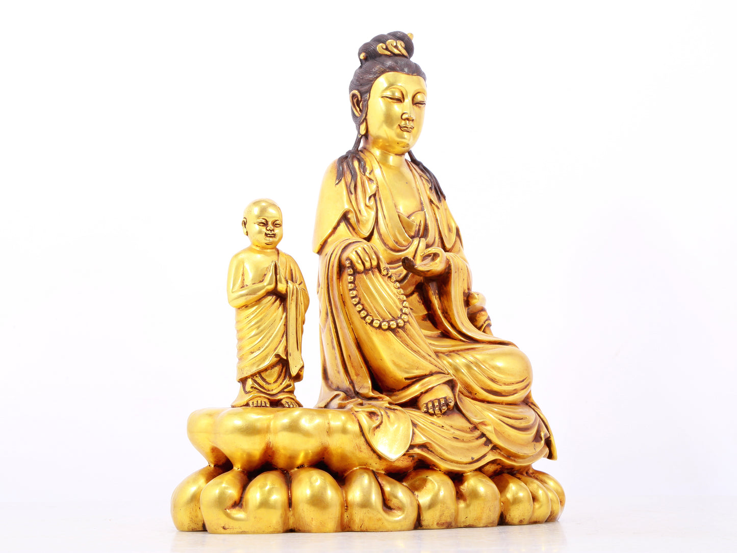 A majestic gilt bronze statue of Guanyin