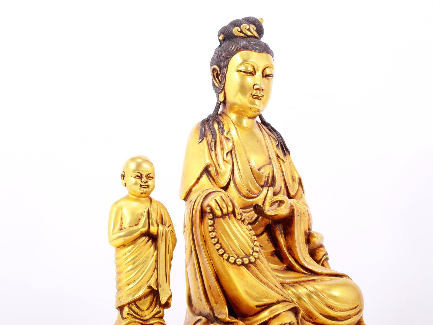 A majestic gilt bronze statue of Guanyin