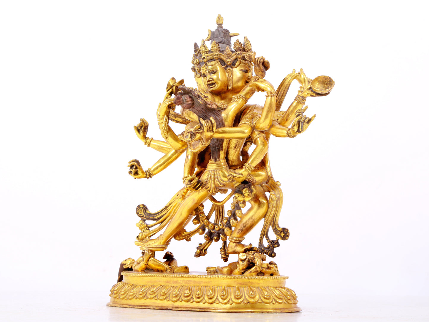 A majestic gilt bronze statue of the joyful Buddha