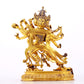 A majestic gilt bronze statue of the joyful Buddha