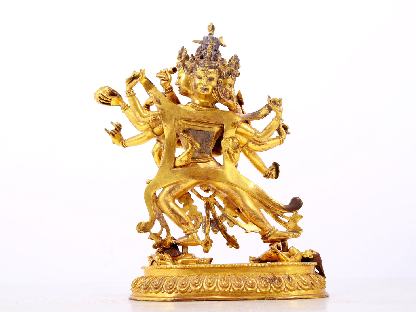 A majestic gilt bronze statue of the joyful Buddha