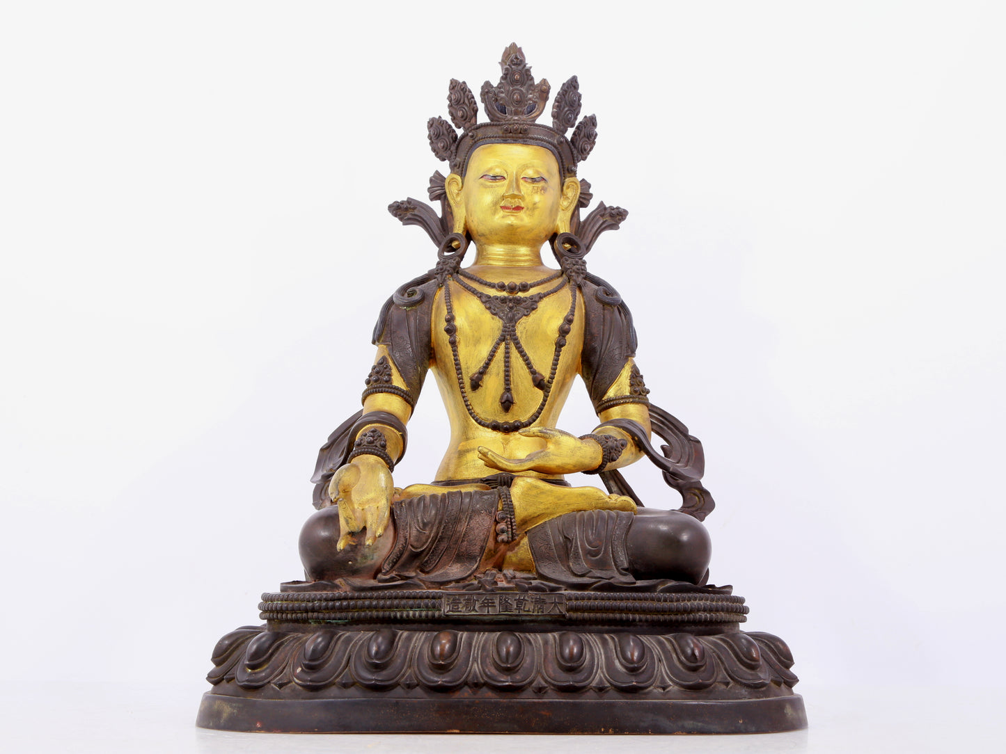 A solemn gilt bronze statue of Bodhisattva