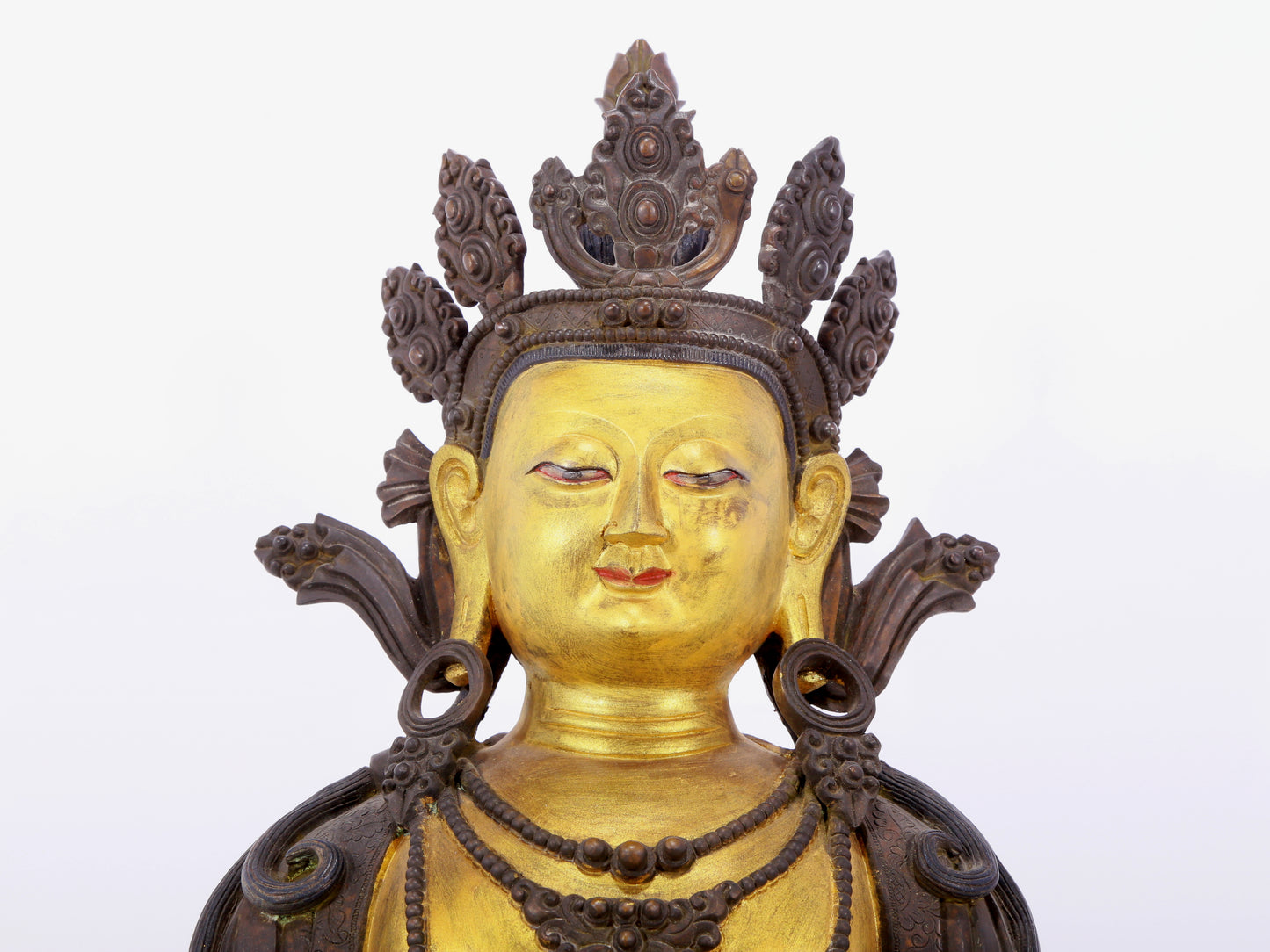 A solemn gilt bronze statue of Bodhisattva