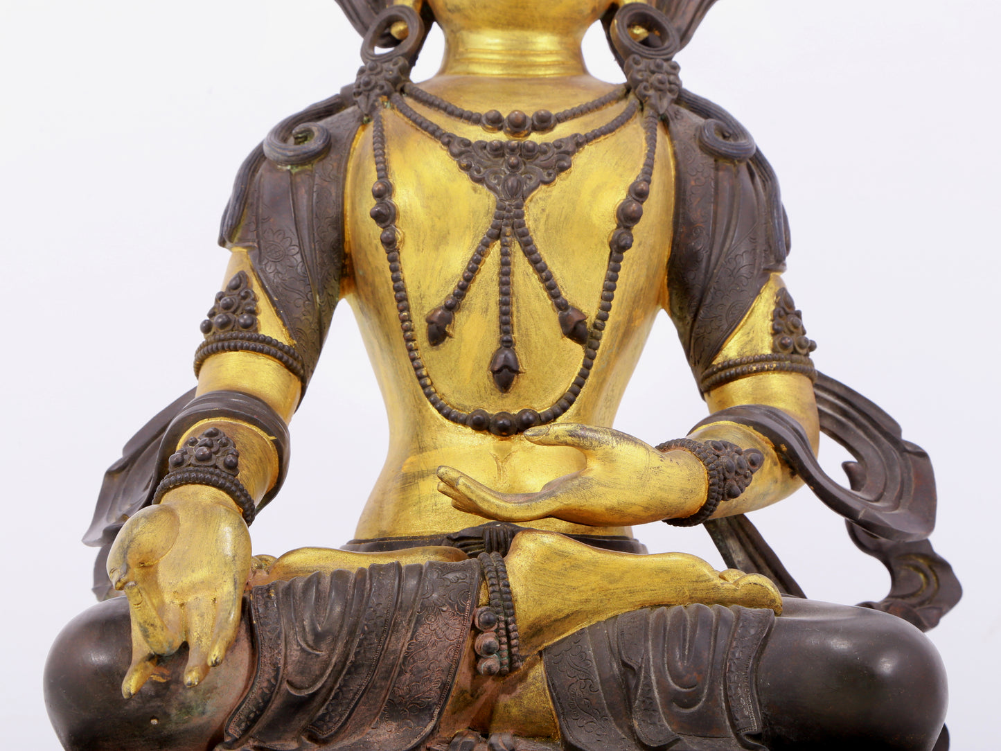 A solemn gilt bronze statue of Bodhisattva