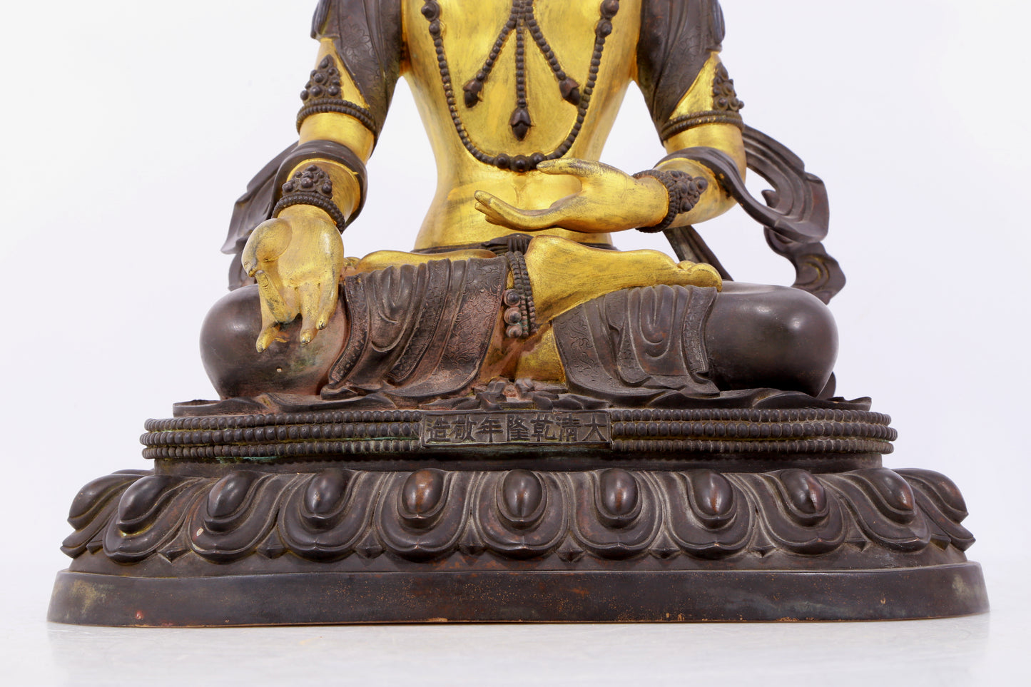 A solemn gilt bronze statue of Bodhisattva