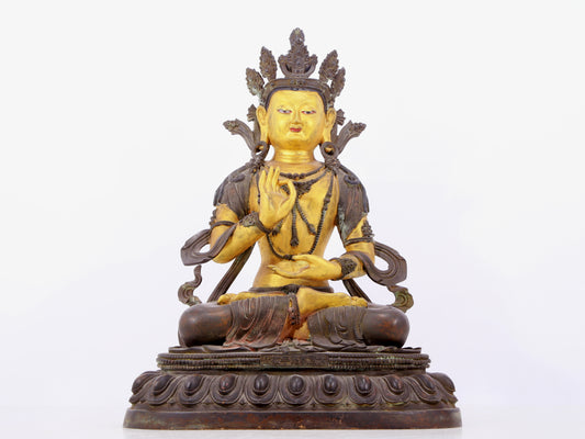 A solemn gilt bronze statue of Bodhisattva