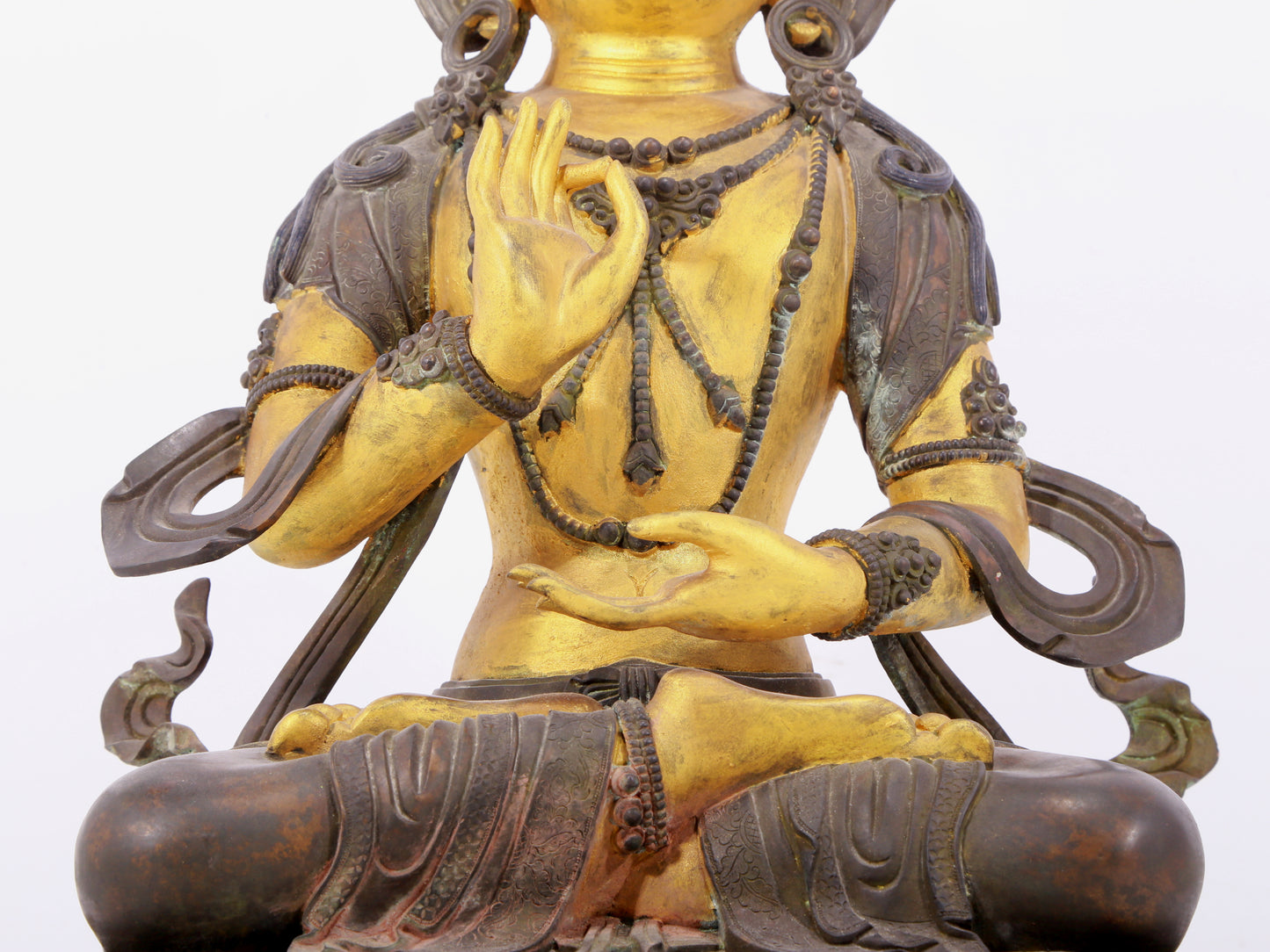 A solemn gilt bronze statue of Bodhisattva