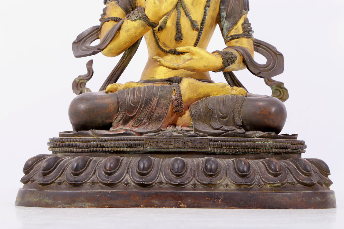 A solemn gilt bronze statue of Bodhisattva