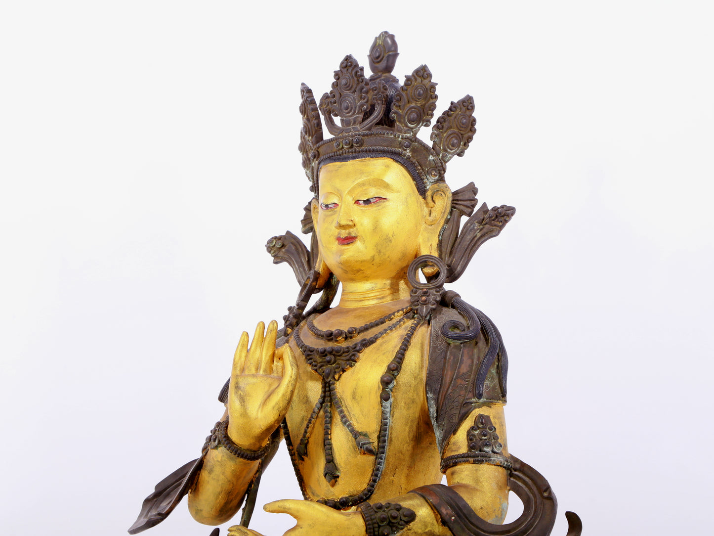 A solemn gilt bronze statue of Bodhisattva