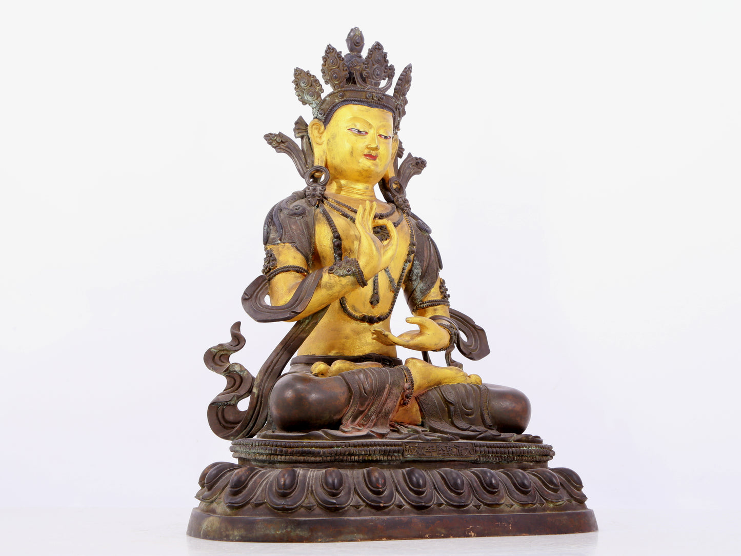 A solemn gilt bronze statue of Bodhisattva