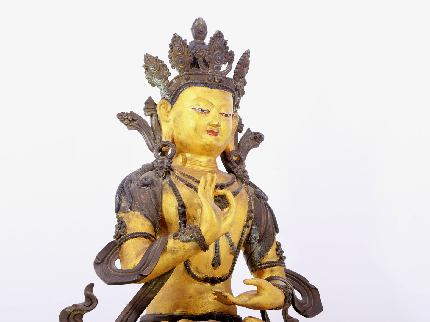 A solemn gilt bronze statue of Bodhisattva