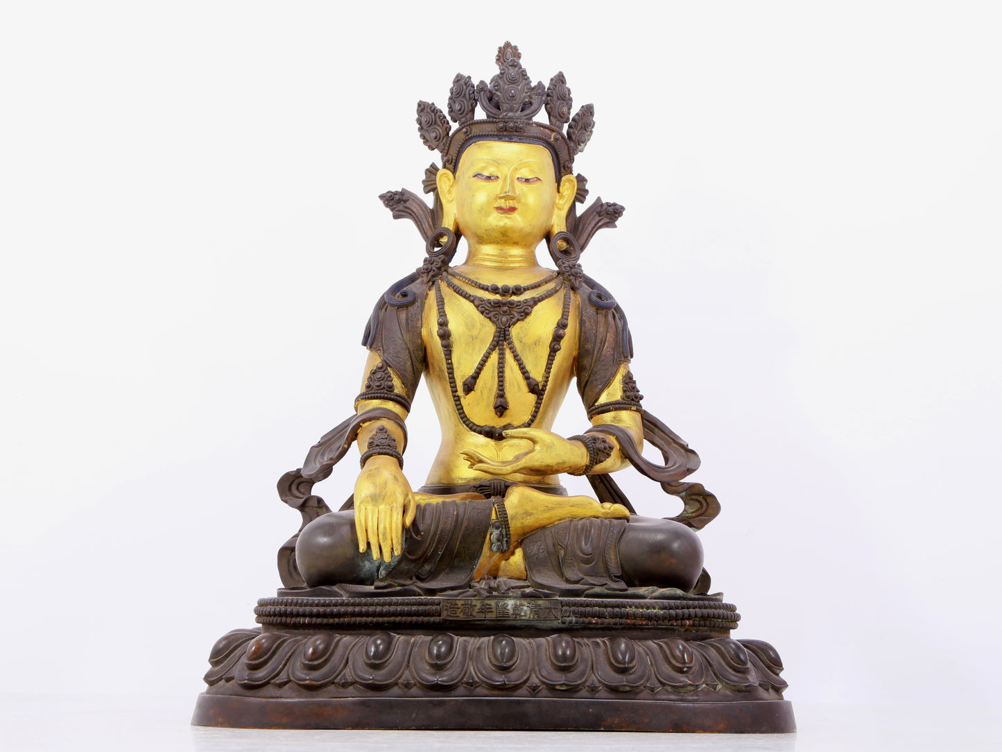 A solemn gilt bronze statue of Bodhisattva