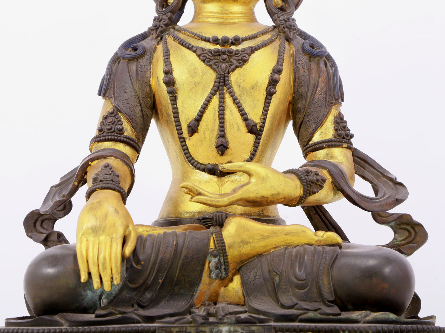 A solemn gilt bronze statue of Bodhisattva