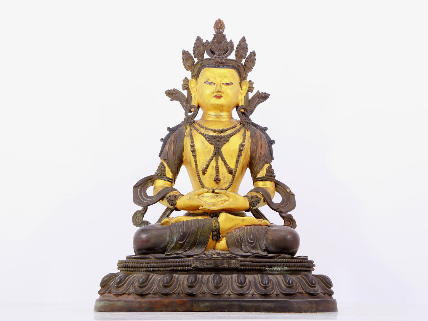 A solemn gilt bronze statue of Bodhisattva