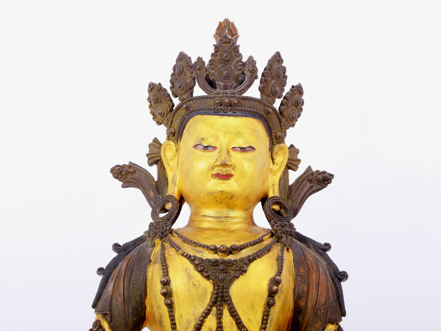 A solemn gilt bronze statue of Bodhisattva