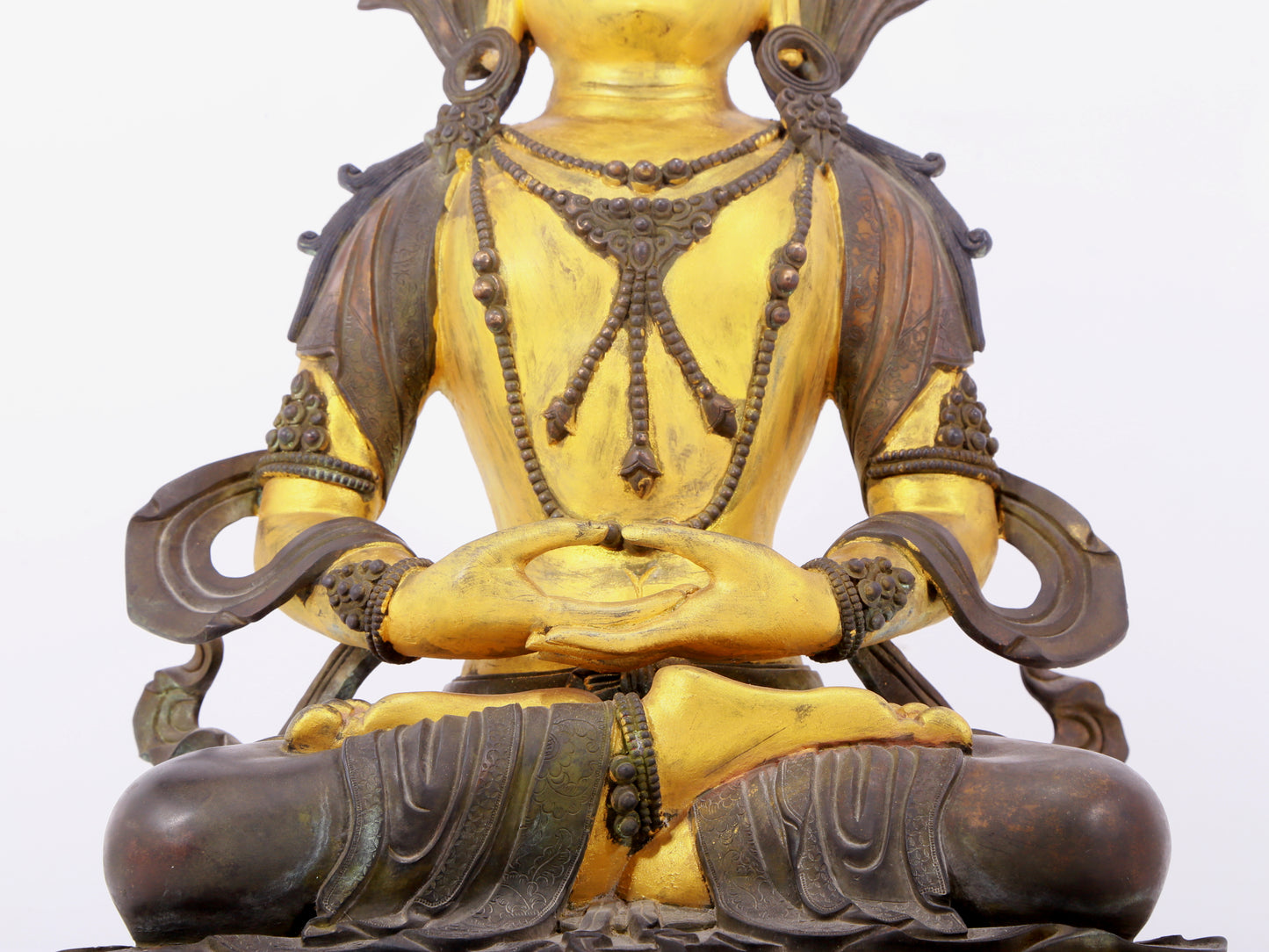 A solemn gilt bronze statue of Bodhisattva