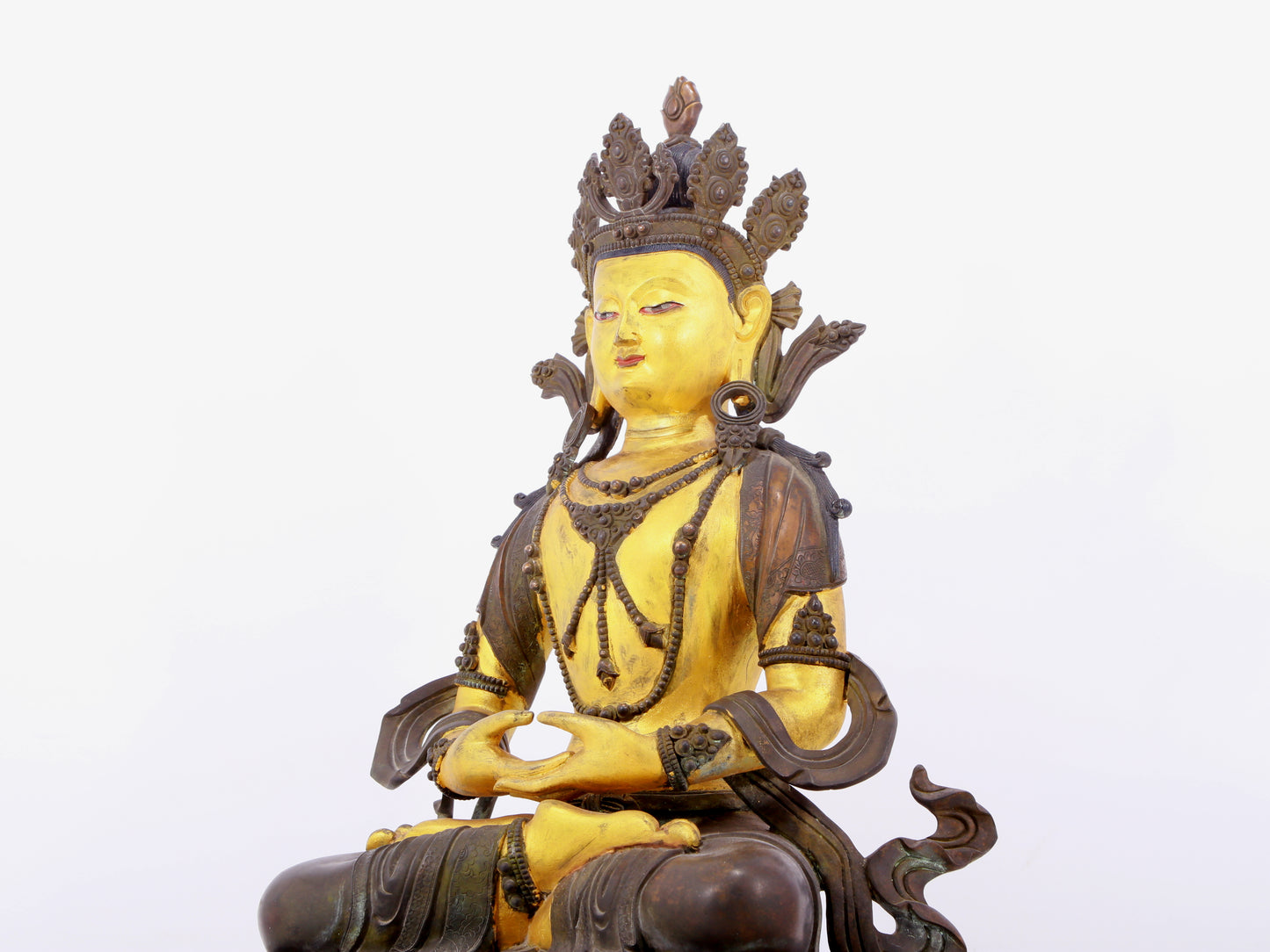 A solemn gilt bronze statue of Bodhisattva