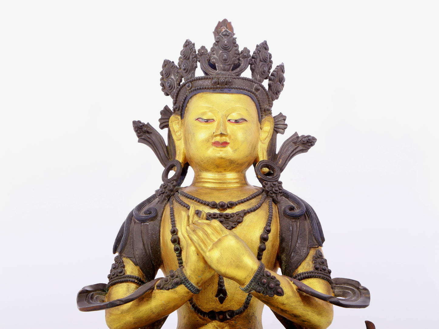 A solemn gilt bronze statue of Bodhisattva