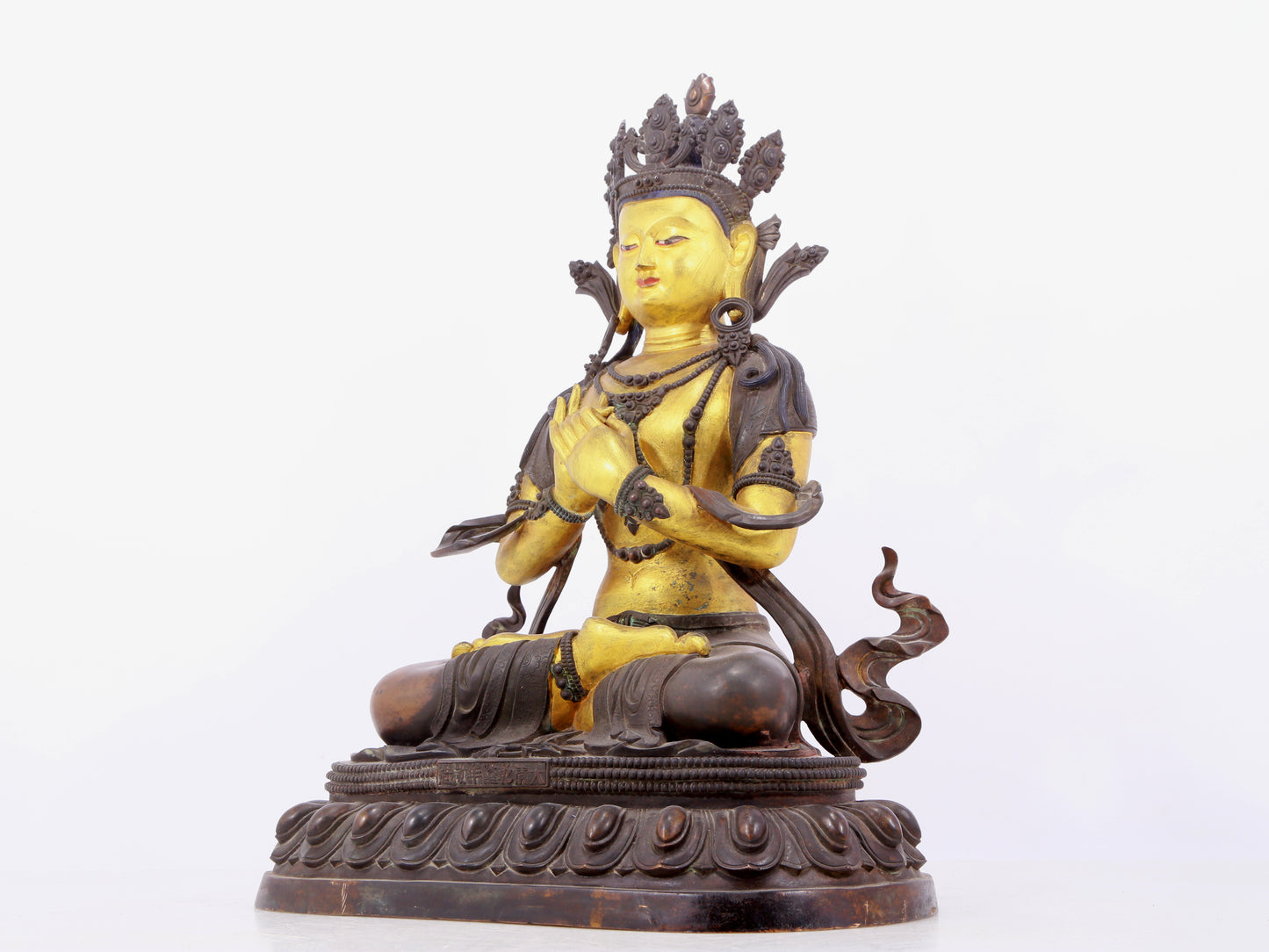 A solemn gilt bronze statue of Bodhisattva