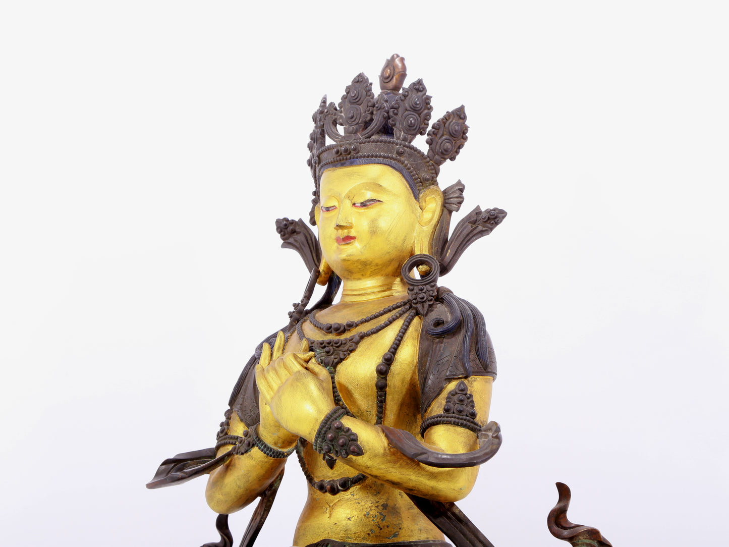 A solemn gilt bronze statue of Bodhisattva