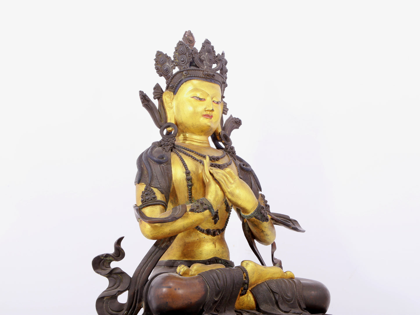 A solemn gilt bronze statue of Bodhisattva