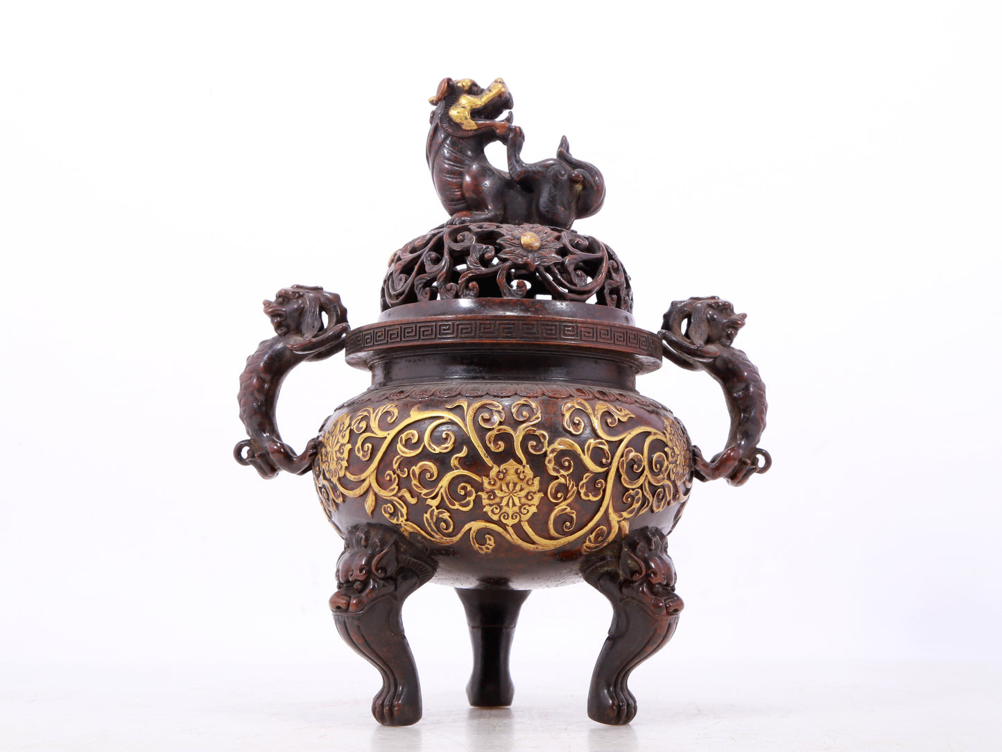 An exquisite gilt bronze censer with double ears and three legs with lotus and auspicious animal patterns.