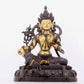 A solemn gilt bronze statue of green Tara