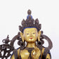 A solemn gilt bronze statue of green Tara