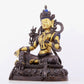 A solemn gilt bronze statue of green Tara