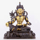 A solemn gilt bronze statue of green Tara