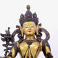 A solemn gilt bronze statue of green Tara