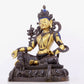 A solemn gilt bronze statue of green Tara