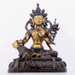 A solemn gilt bronze statue of green Tara