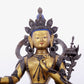 A solemn gilt bronze statue of green Tara