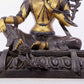 A solemn gilt bronze statue of green Tara